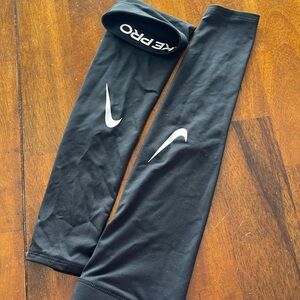 Nike sports arm sleeves men’s size S/M.
